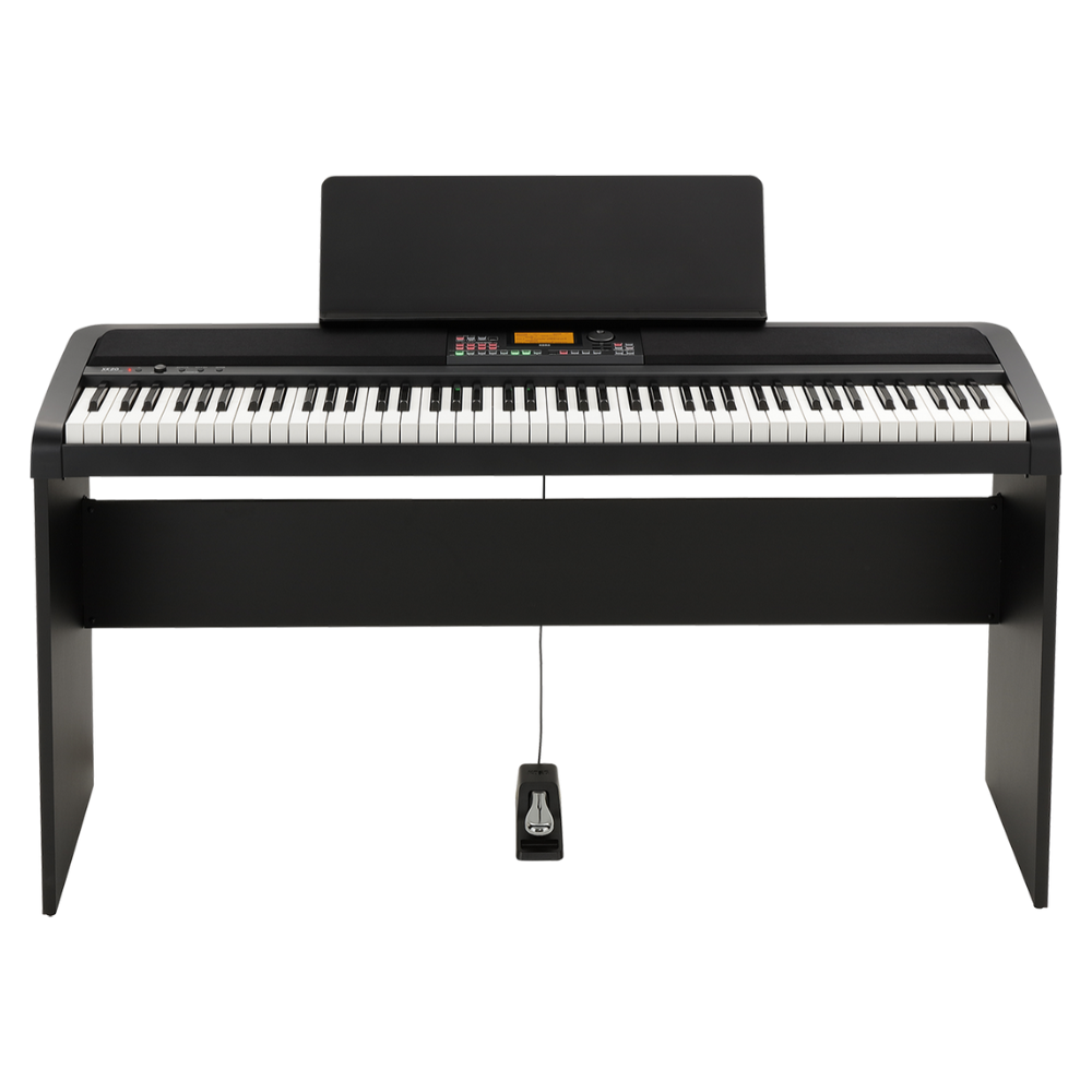 Black digital piano with a bench on a white background