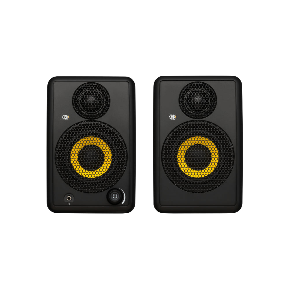 Pair of black speakers with yellow circular design on a white background