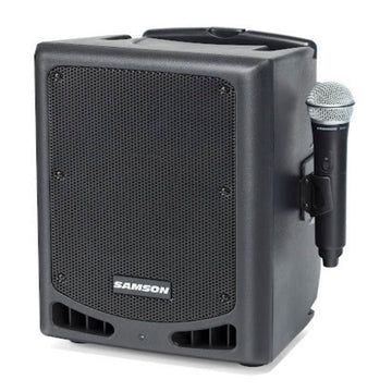 Samson portable speaker with a microphone attached.