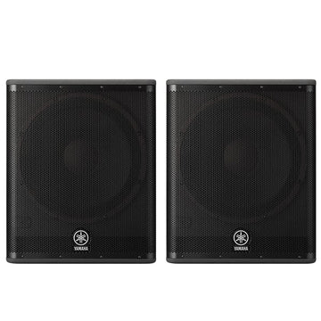 Two black Yamaha speakers on a white background