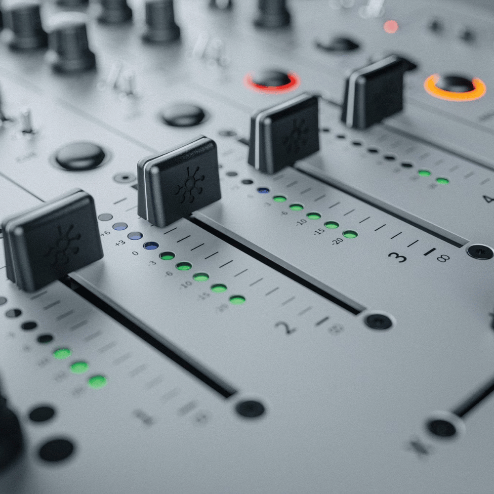 Close-up of a sound mixing console with control knobs and LED indicators.