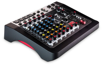Audio mixing console with various knobs and buttons on a white background