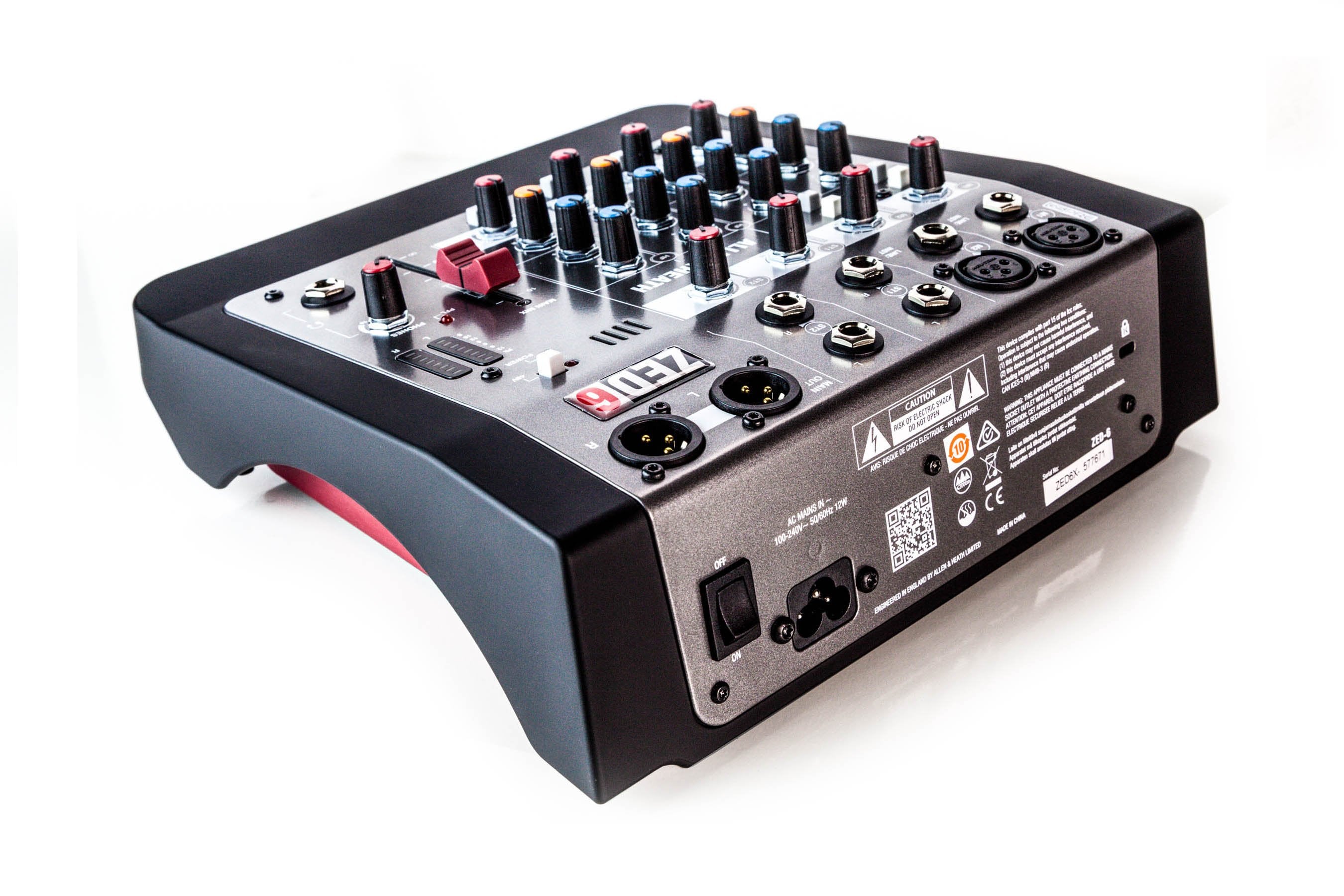 Audio mixer with control knobs and ports on a white background