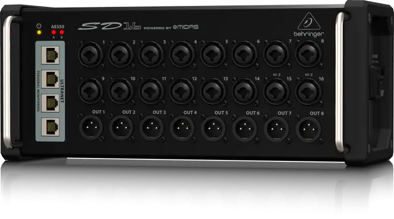 Black audio interface with multiple ports and Behringer branding on a white background