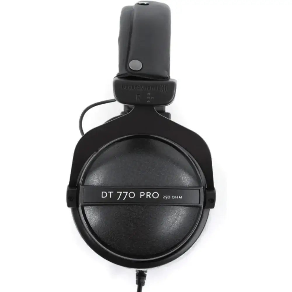 Black headphones with 'DT 770 Pro' branding on a white background