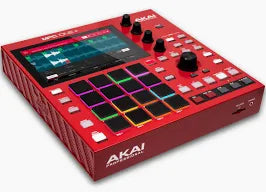 Red electronic music production controller with display and buttons on a white background