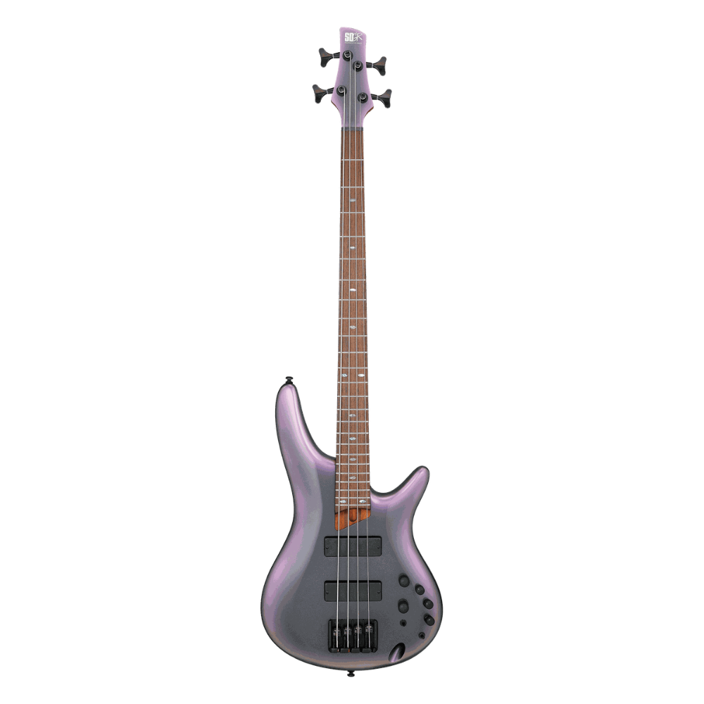 Purple electric bass guitar on a white background