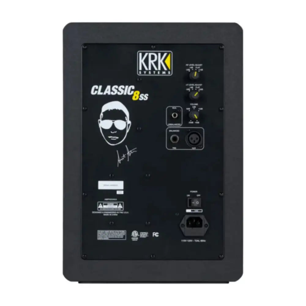 Back panel of a KRK speaker with branding and connectivity options on a white background