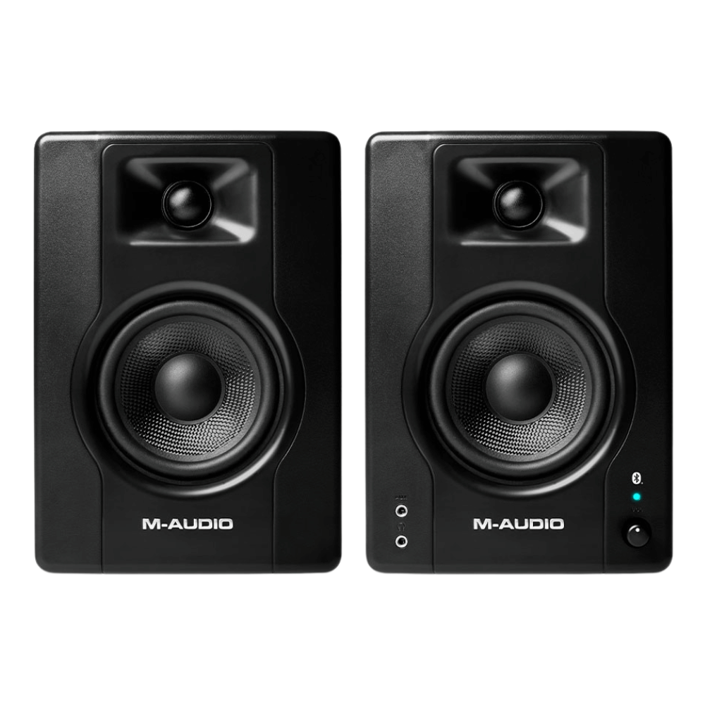 Pair of M-Audio studio monitors on a white background