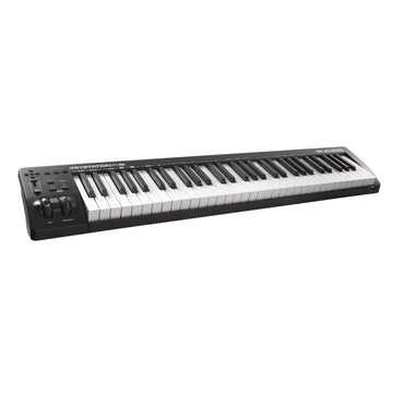 Black and white keyboard controller on a white background
