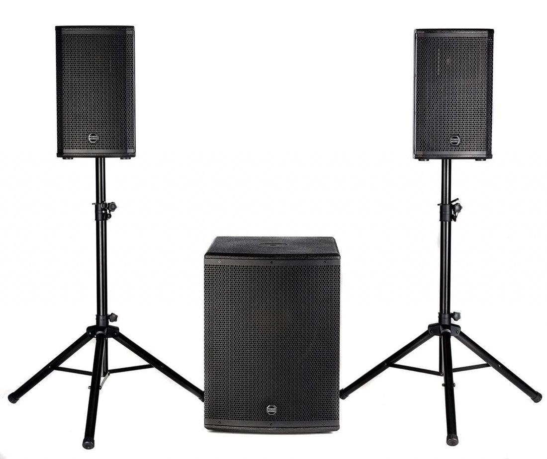 Set of black speakers on stands with a subwoofer on a white background