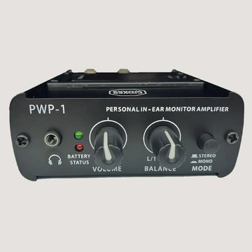 Personal in-ear monitor amplifier with control knobs and indicator lights on a gray background