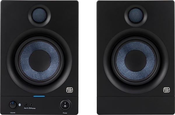 Pair of black studio monitors with blue mesh drivers on a white background