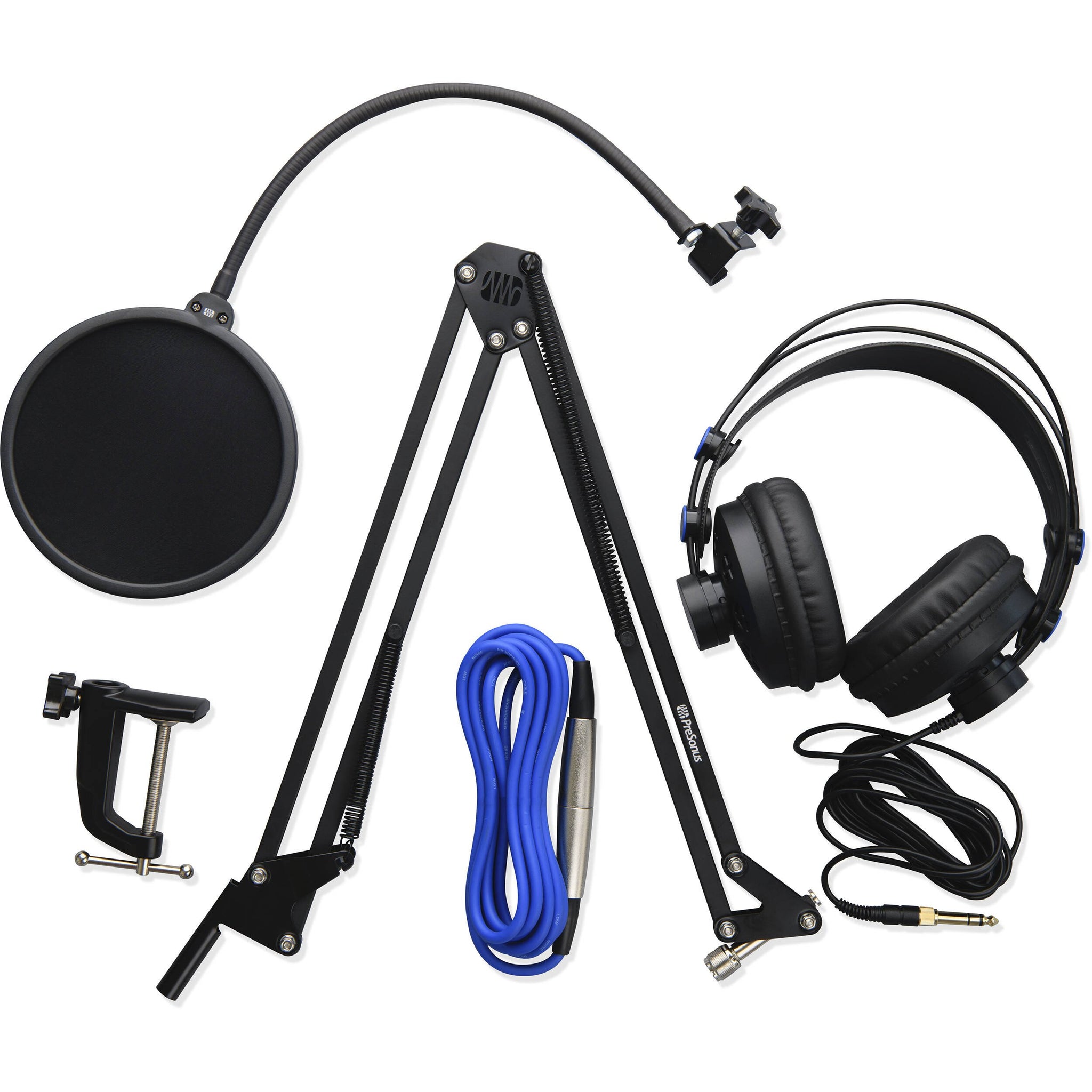Studio microphone setup with pop filter, stand, headphones, and cables on a white background