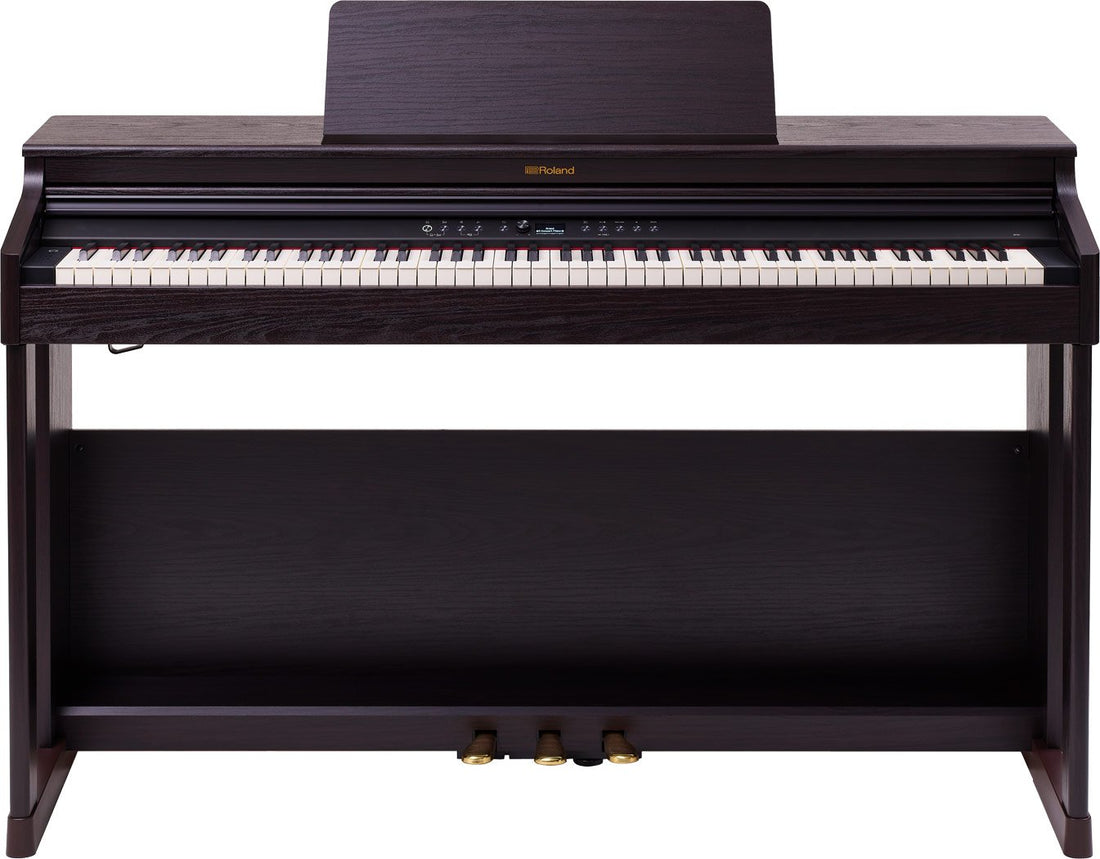 Roland digital piano with a dark finish on a white background