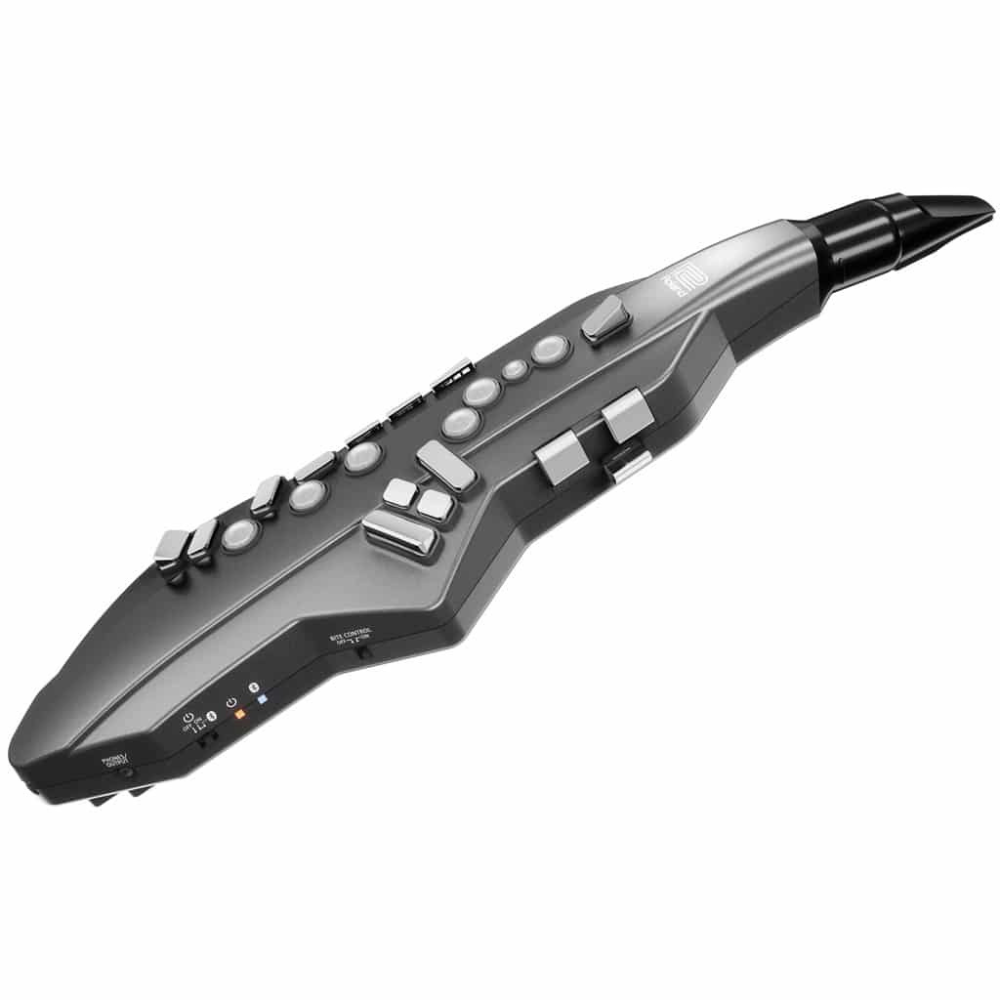 Guitar-shaped electronic device with buttons and a stylus on a white background