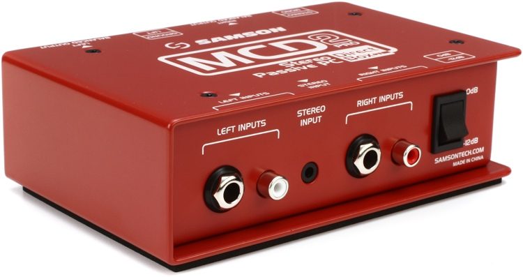 Red audio interface with multiple inputs on a white background