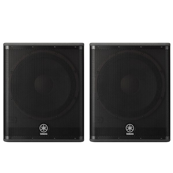 Two black Yamaha speakers on a white background