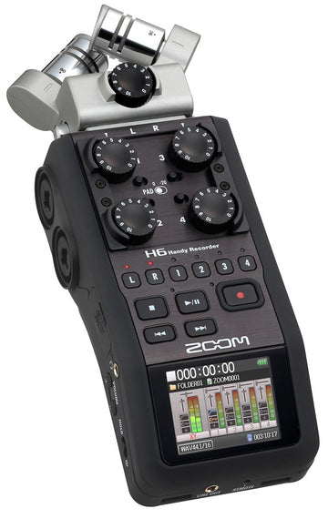 Handheld Zoom H6 audio recorder with a white background