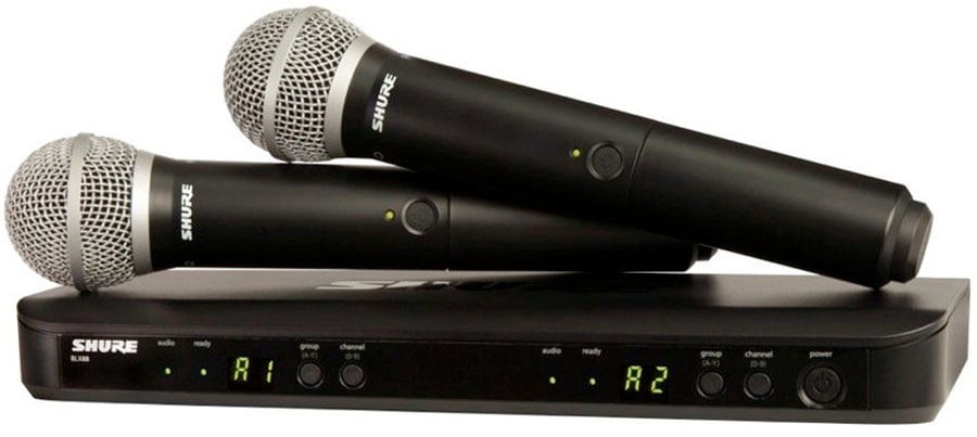 Shure wireless microphone system with receiver on a white background