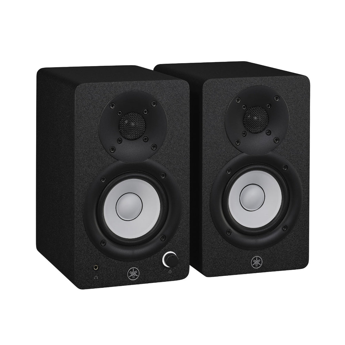 Pair of black studio monitors on a white background
