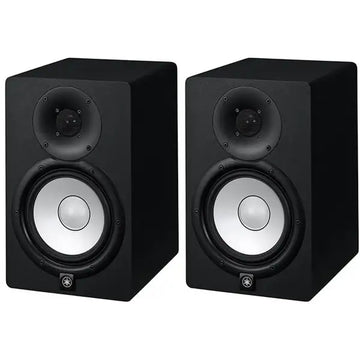 Pair of black studio monitors on a white background