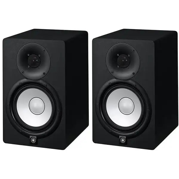 Pair of black studio monitors on a white background