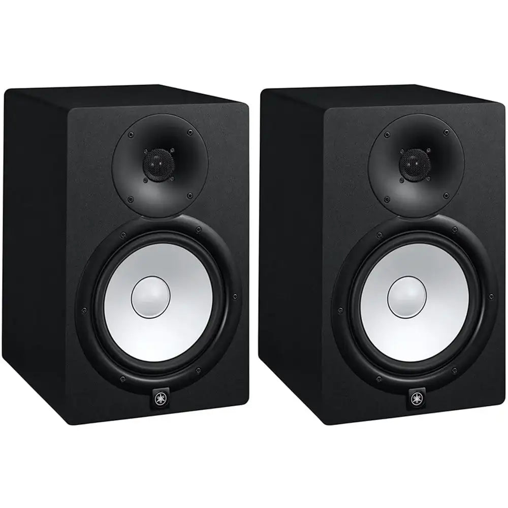 Pair of black studio monitors on a white background