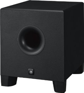 Black subwoofer speaker on a black background