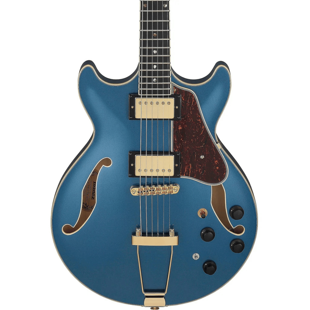 Blue electric guitar on a white background